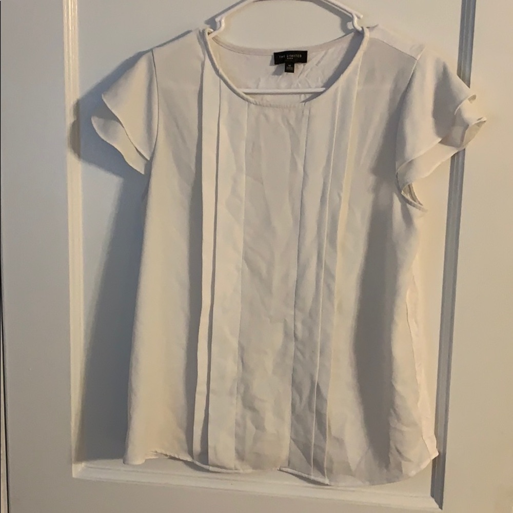 The limited white detail blouse